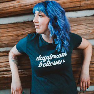 woman with blue hair wearing t shirt 