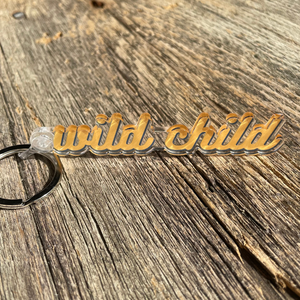 gold wild child keychain 