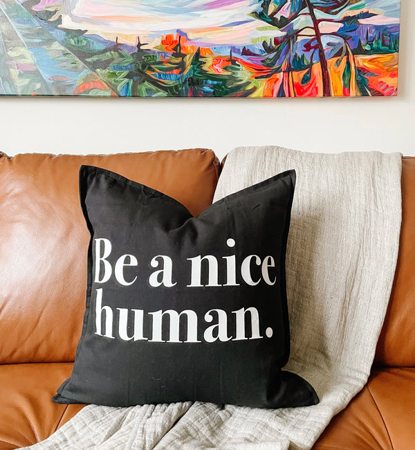 be a nice human black pillow case 