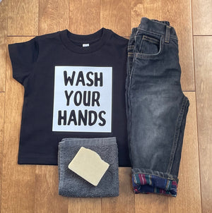 toddler t shirt, toddler jeans, and towel with soap 